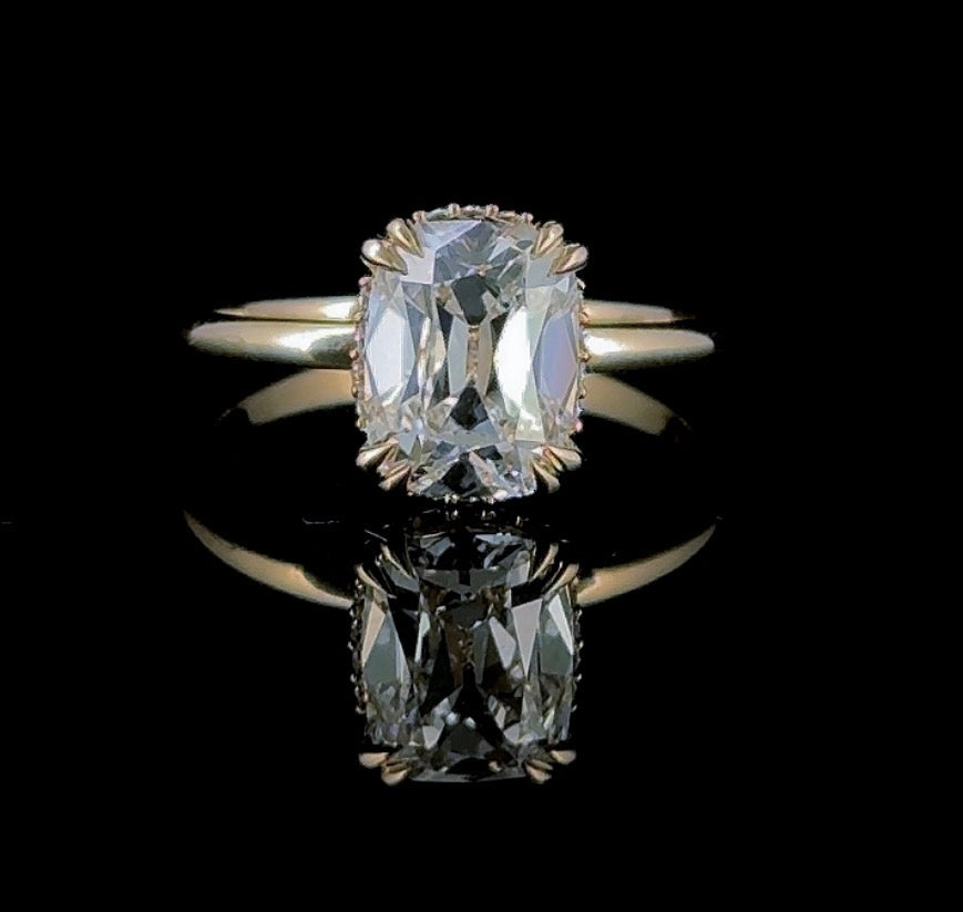 “The Georgia” | 2ct old mine cut diamond ring with peekaboo halo