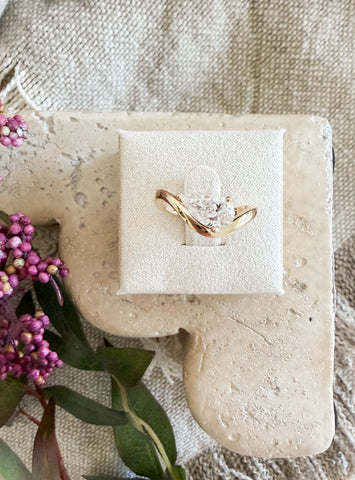 Wave offset diamond ring